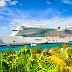 Cruise ship docked, sunny day in a tropical Caribbean island